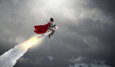 Woman riding missile. Mixed mediaの写真素材