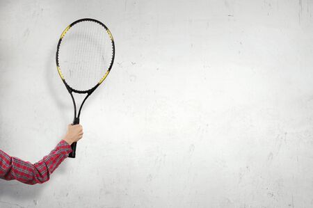 Racket in person hand