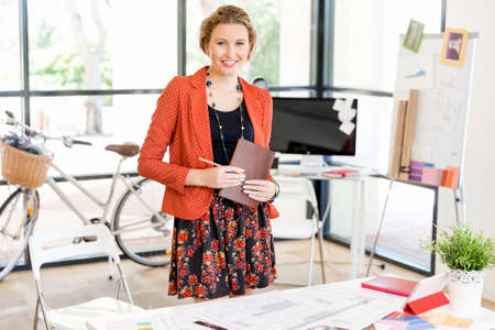 Young woman in office