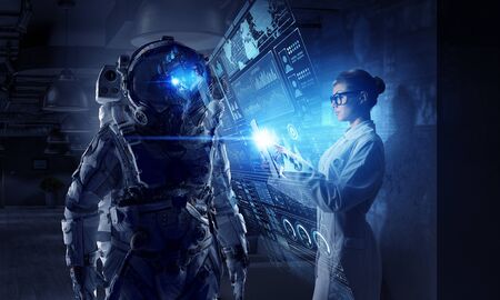 Scientists designing space suit. Mixed media