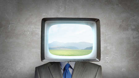 Monitor headed businessman. Mixed mediaの写真素材