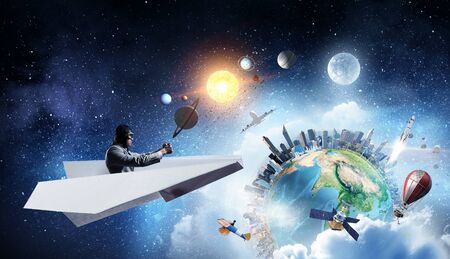 Aviator in origami plane. Mixed mediaの写真素材