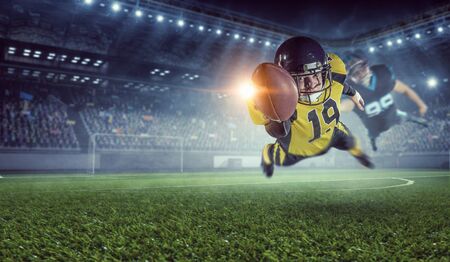 Center player with ball in hands. Mixed mediaの写真素材