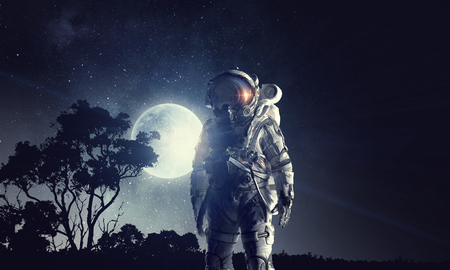 Astronaut in outer space. Mixed mediaの写真素材