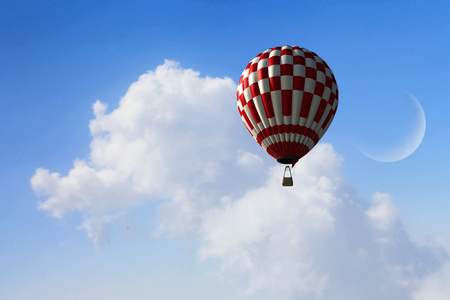 Aerostat flying above cloudsの写真素材