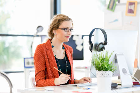 Young woman in officeの写真素材