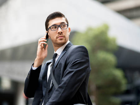 Portrait of handsome businessman outdoorの写真素材