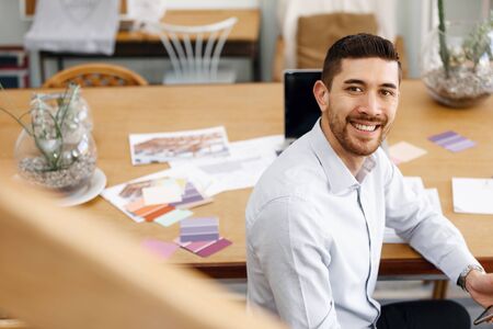 Young man in offficeの写真素材