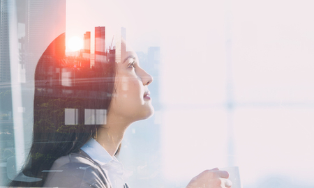 Business lady and big cityの写真素材