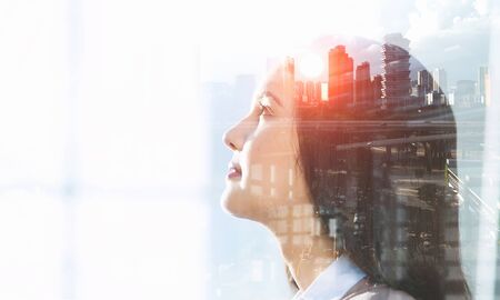 Business lady and big cityの写真素材