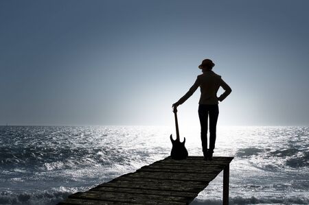 Rock girl with guitar. Mixed mediaの写真素材