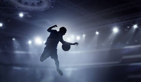 Soccer player in action . Mixed mediaの写真素材