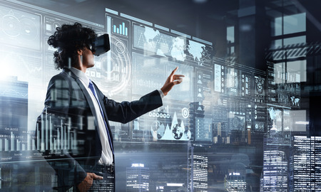 Experiencing virtual reality. Mixed mediaの写真素材