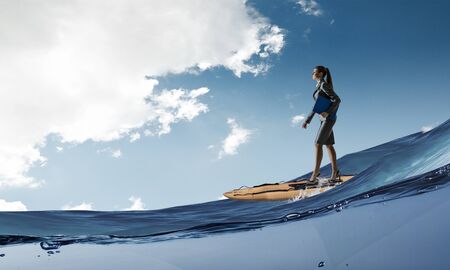 Catching success wave. Mixed mediaの写真素材