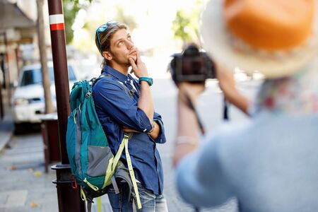 Smiling couple with the cameraの写真素材