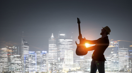 Rock guy with guitar. Mixed mediaの写真素材