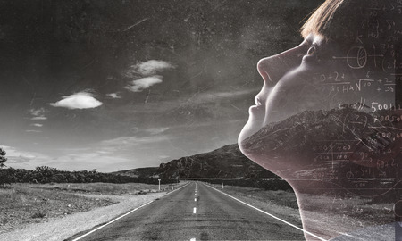 Cute girl looking upの写真素材