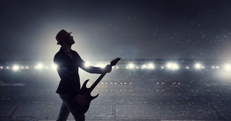 Rock guy with guitar. Mixed mediaの写真素材