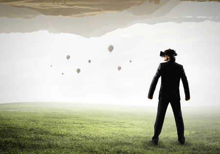 Experiencing virtual reality. Mixed mediaの写真素材