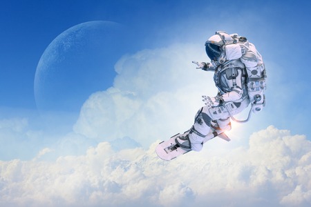 Spaceman on flying board. Mixed mediaの写真素材