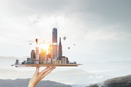 Waiter presenting on tray urban construction sample. Mixed mediaの写真素材