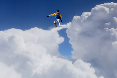 Snowboarder making jumpの写真素材