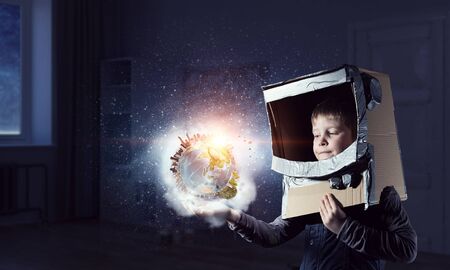 He wants to become astronaut . Mixed mediaの写真素材