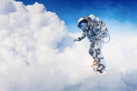 Spaceman on flying board. Mixed media