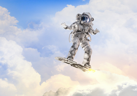 Spaceman on flying board. Mixed media