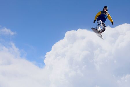 Snowboarder making jumpの写真素材
