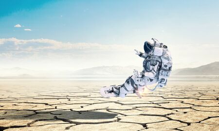 Spaceman on flying board. Mixed mediaの写真素材