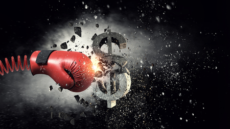 Red boxing glove on spring breaking concrete dollar sign. Mixed mediaの写真素材