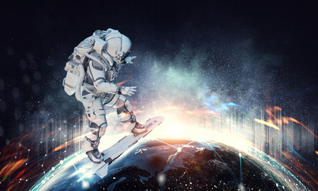 Spaceman on flying board. Mixed mediaの写真素材