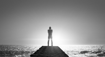 Silhouette of man in hoodyの写真素材