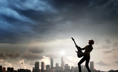Rock girl with guitar. Mixed mediaの写真素材
