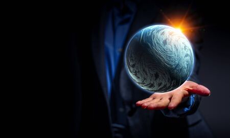 Whole world in hands. Mixed mediaの写真素材