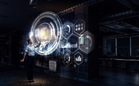 Businesswoman in his office . Mixed mediaの写真素材