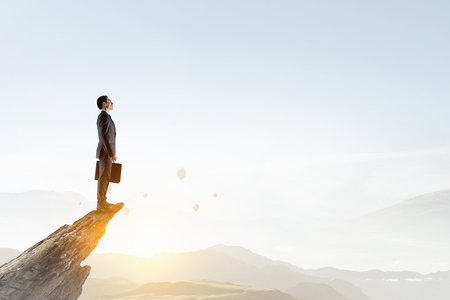 Reaching the top. Mixed mediaの写真素材