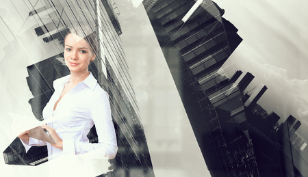 Elegant woman use tablet. Mixed mediaの写真素材