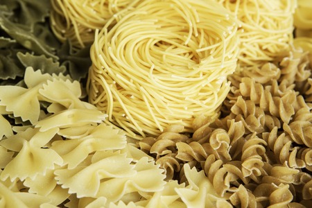 Close of uncooked macaroni . Mixed mediaの写真素材