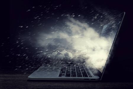 Glowing laptop device. Mixed mediaの写真素材