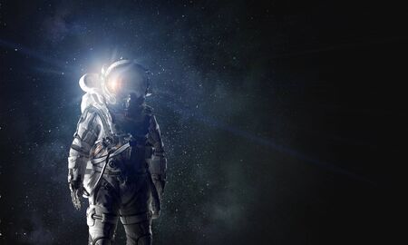 Spaceman in astronaut suit. Mixed mediaの写真素材