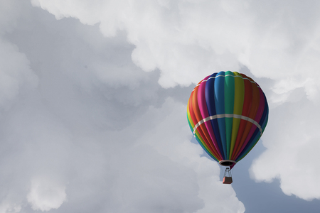 Aerostat floating in day sky. Mixed mediaの写真素材
