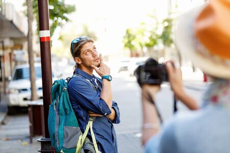 Smiling couple with the cameraの写真素材