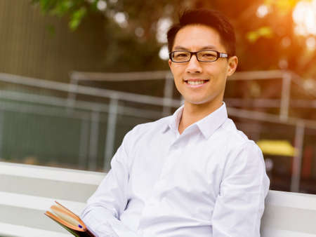 Young businessman during his break in parkの写真素材