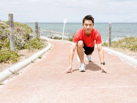 Young man getting ready for a run