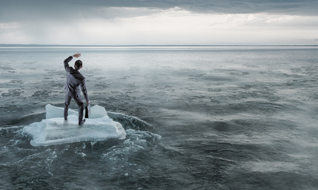 Surfing sea on ice floe. Mixed mediaの写真素材