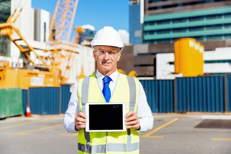 Engineer builder at construction site