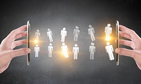 Devices connecting people . Mixed mediaの写真素材