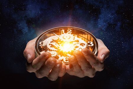 Clockwork in palm. Mixed mediaの写真素材